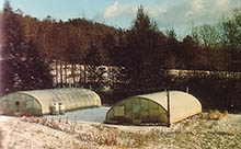 Exterior view of the De Trinis greenhouses.